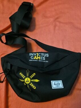 4/$67 Deal! Herschel Supply Company Black Pouch with Invictus Games Logo